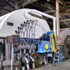 Drum vacuum slurry washer